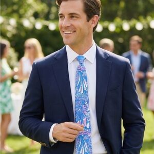 Navy Men's Suit Jacket with White Shirt and Blue Floral Tie